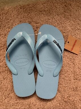 Havaianas Baby Blue Flip Flops with Black Logo